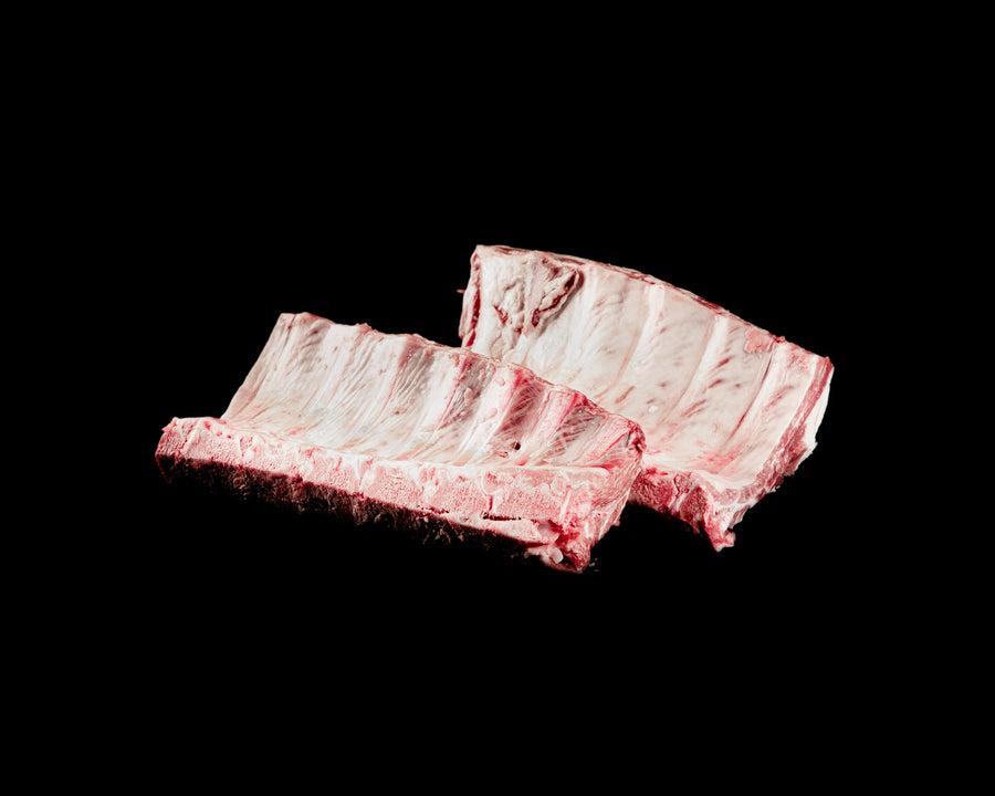 Costilla de cerdo de caserío en tira fresca, para horno o barbacoa