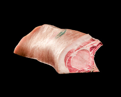 Chuleta madurada de cerdo de caserío con hueso, corte grueso